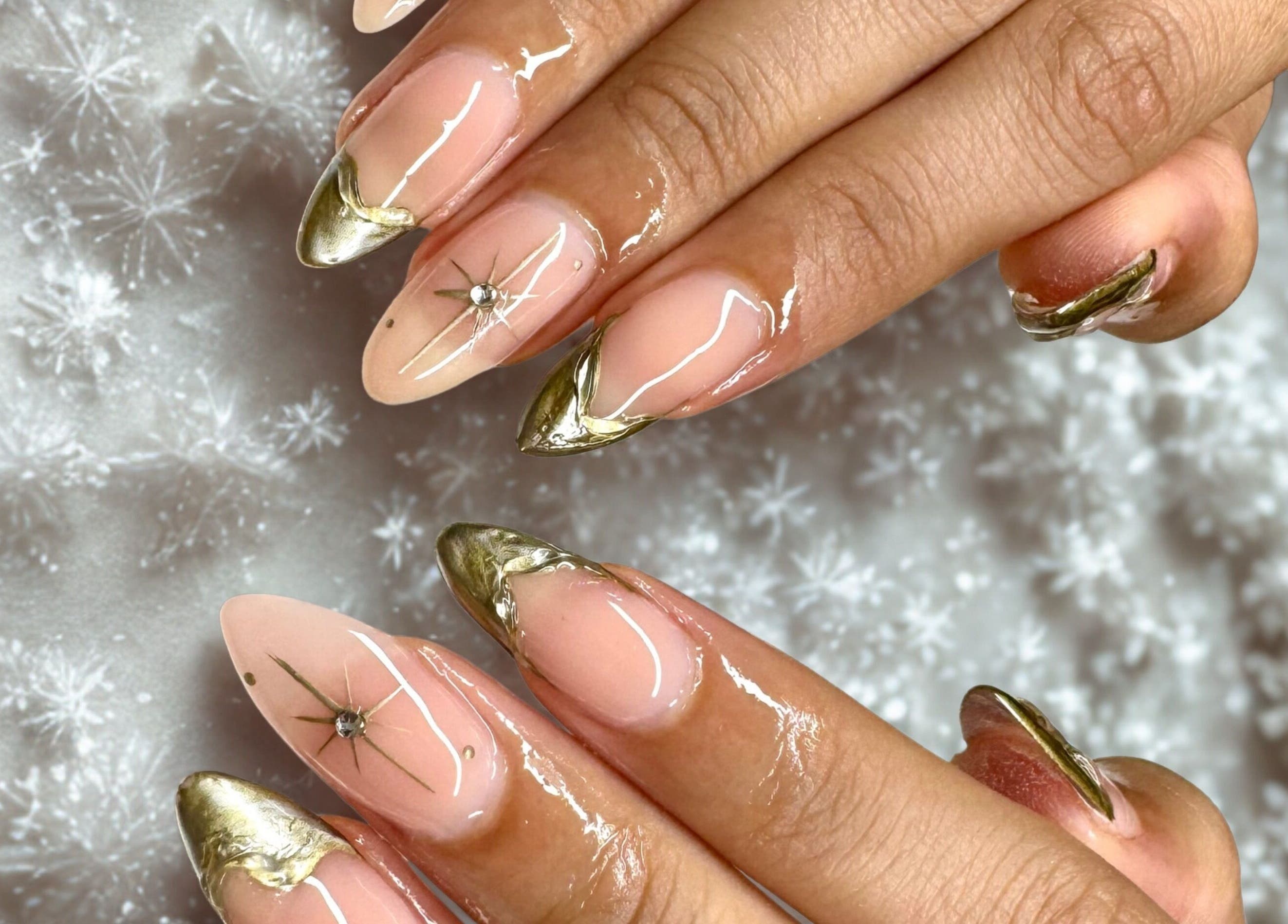 Elegant gold-accented manicure at Afterglow Beauty, Cambridge, England, GB.