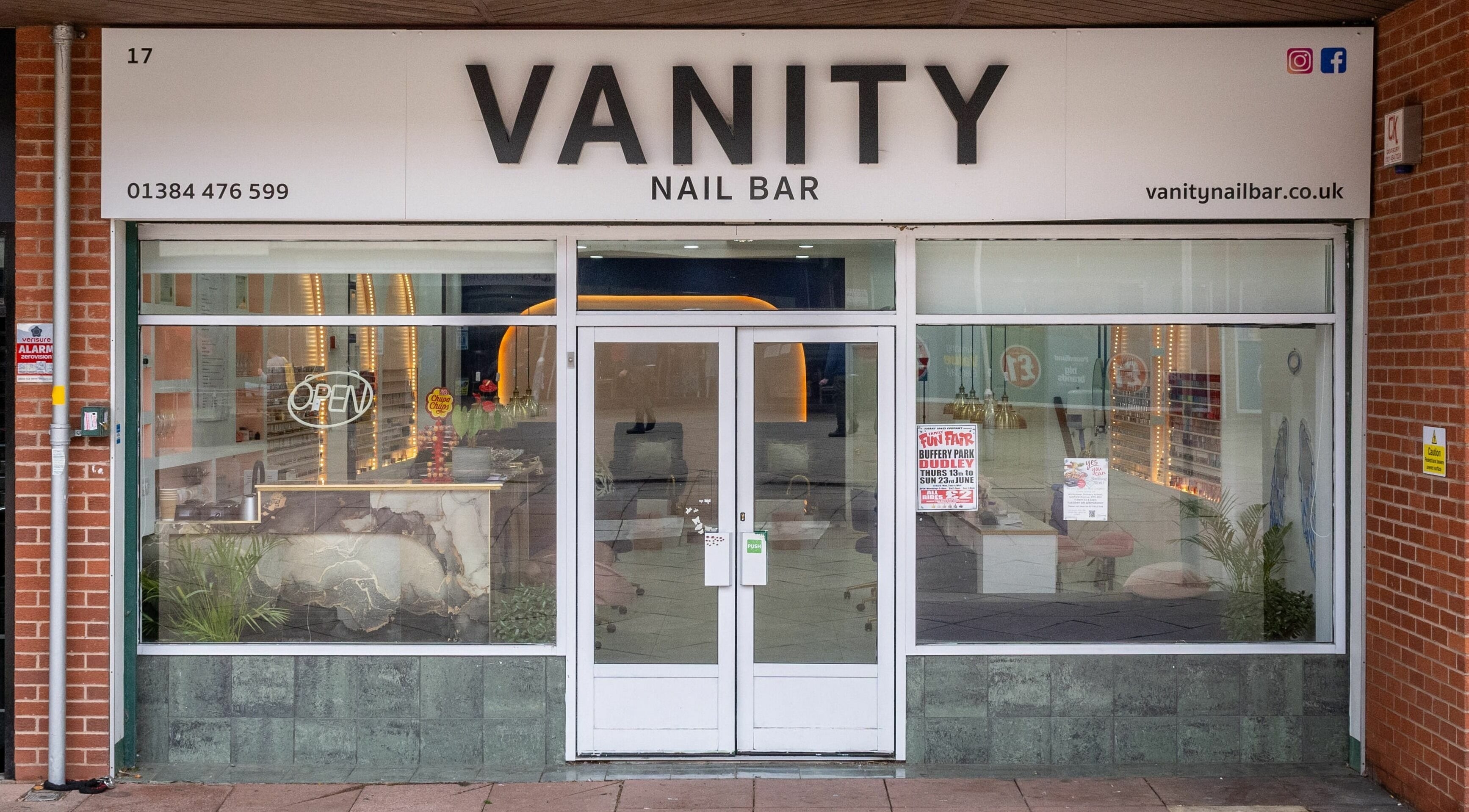 Front view of Vanity Nail Bar in Brierley Hill, England, GB showcasing modern storefront.