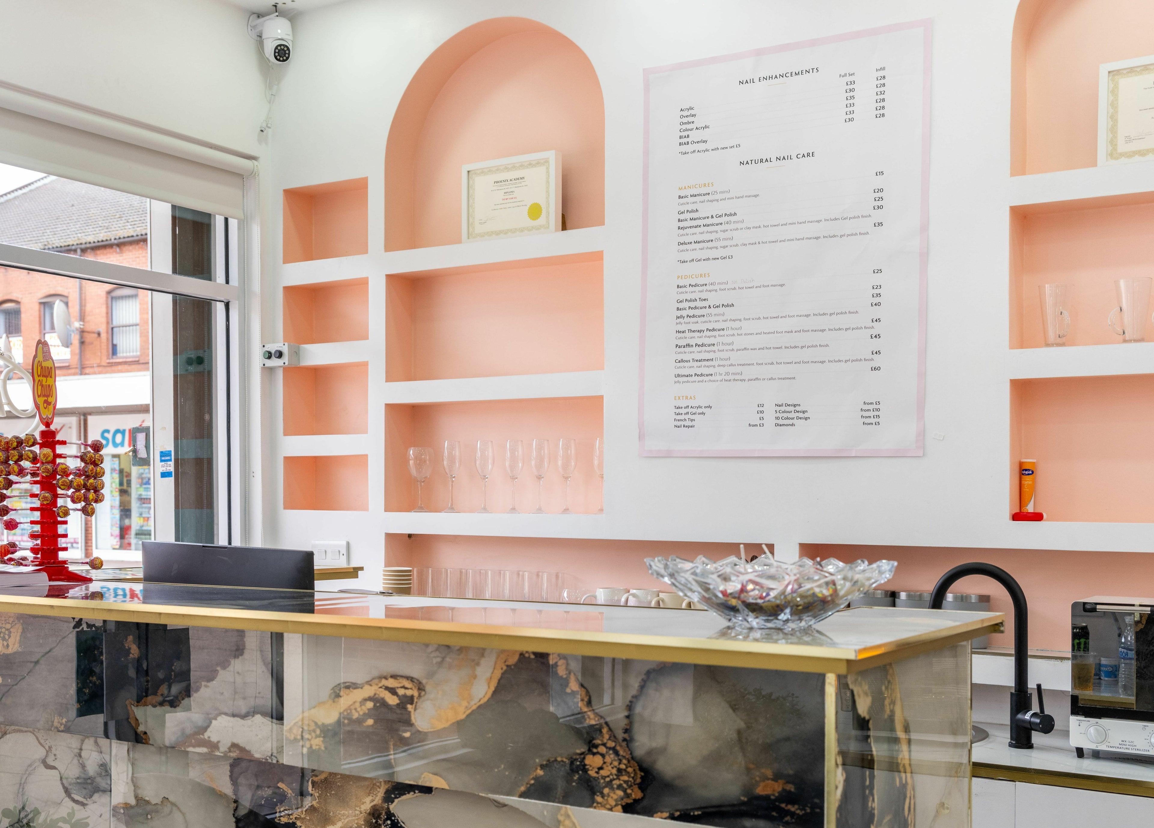 Modern reception at Vanity Nail Bar, Brierley Hill, England, GB, with contemporary design and pastel colors.
