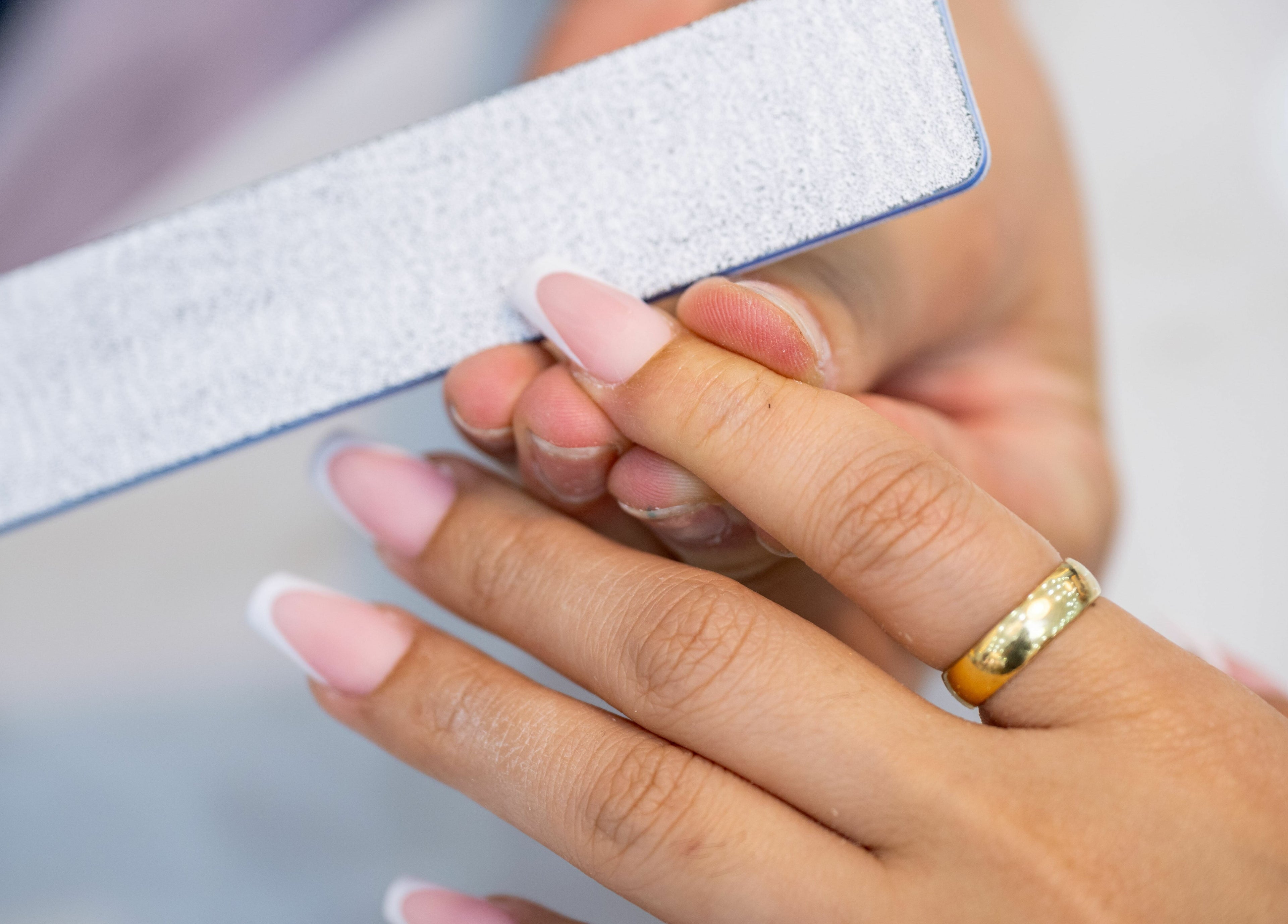 Professional nail filing at Vanity Nail Bar, Brierley Hill, England, GB showcasing elegant nail care.