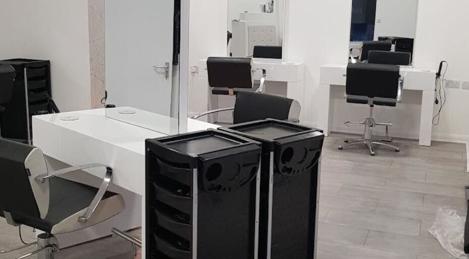 Sleek hair styling stations at Emily H at Roots, Windsor, England, GB, designed for premium beauty experiences.