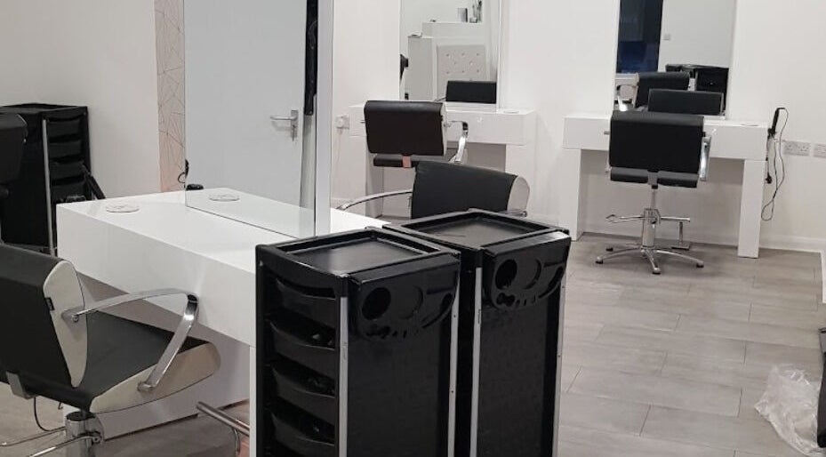 Sleek hair styling stations at Emily H at Roots, Windsor, England, GB, designed for premium beauty experiences.