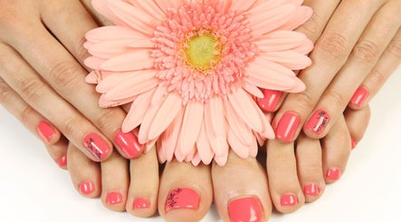 Elegant coral nails with floral design at Beauty FX Nail Studio & Spa, Barrie, Ontario, CA.