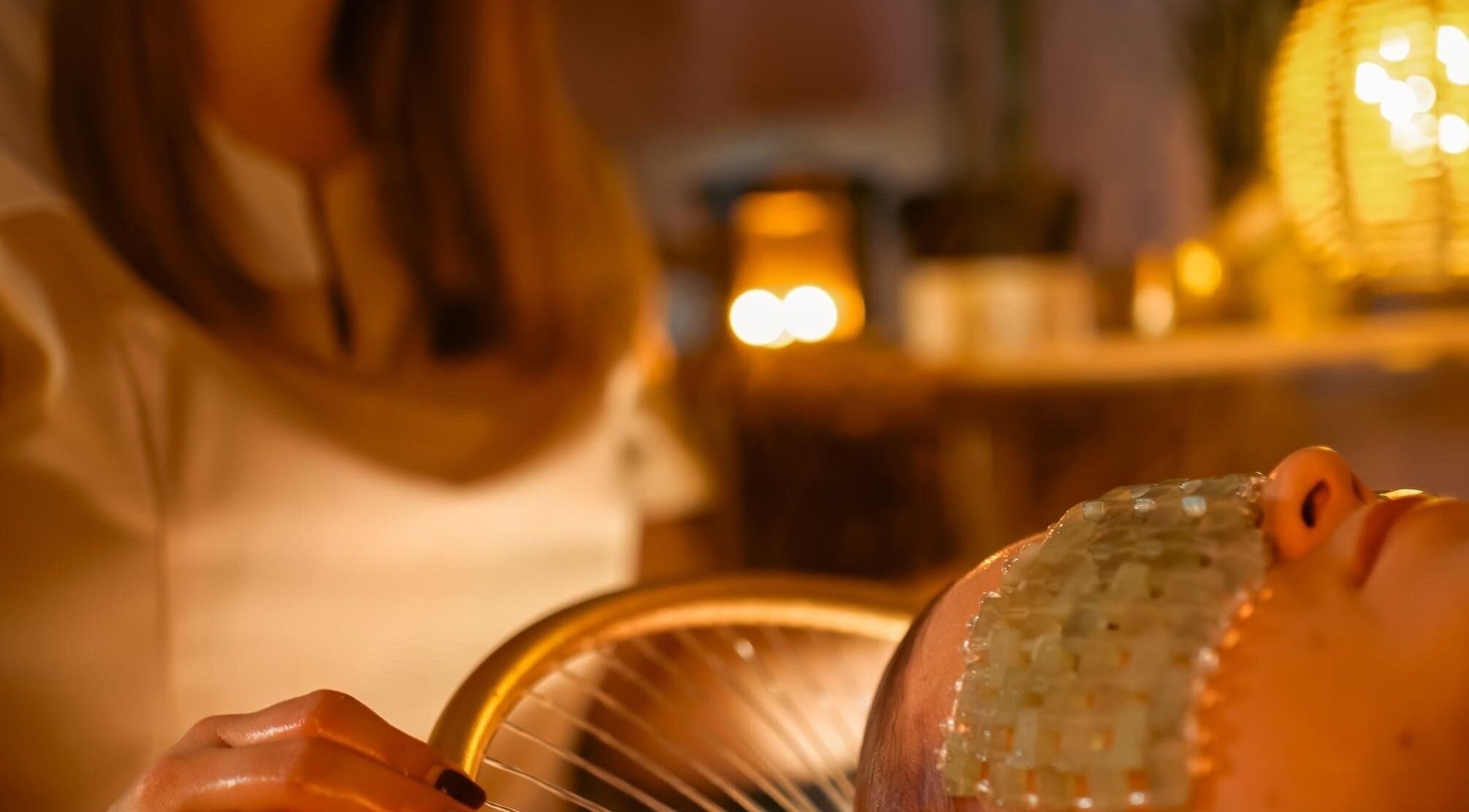 Relaxing face treatment at Bloom Hair & Head Spa, Witney, England, GB with soothing ambiance.