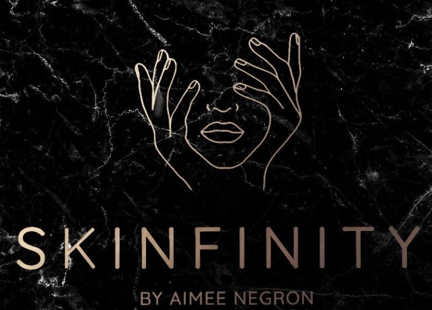Logotipo artístico de SkinFinity by Aimee Negron en fondo negro, San Juan, San Juan, PR.