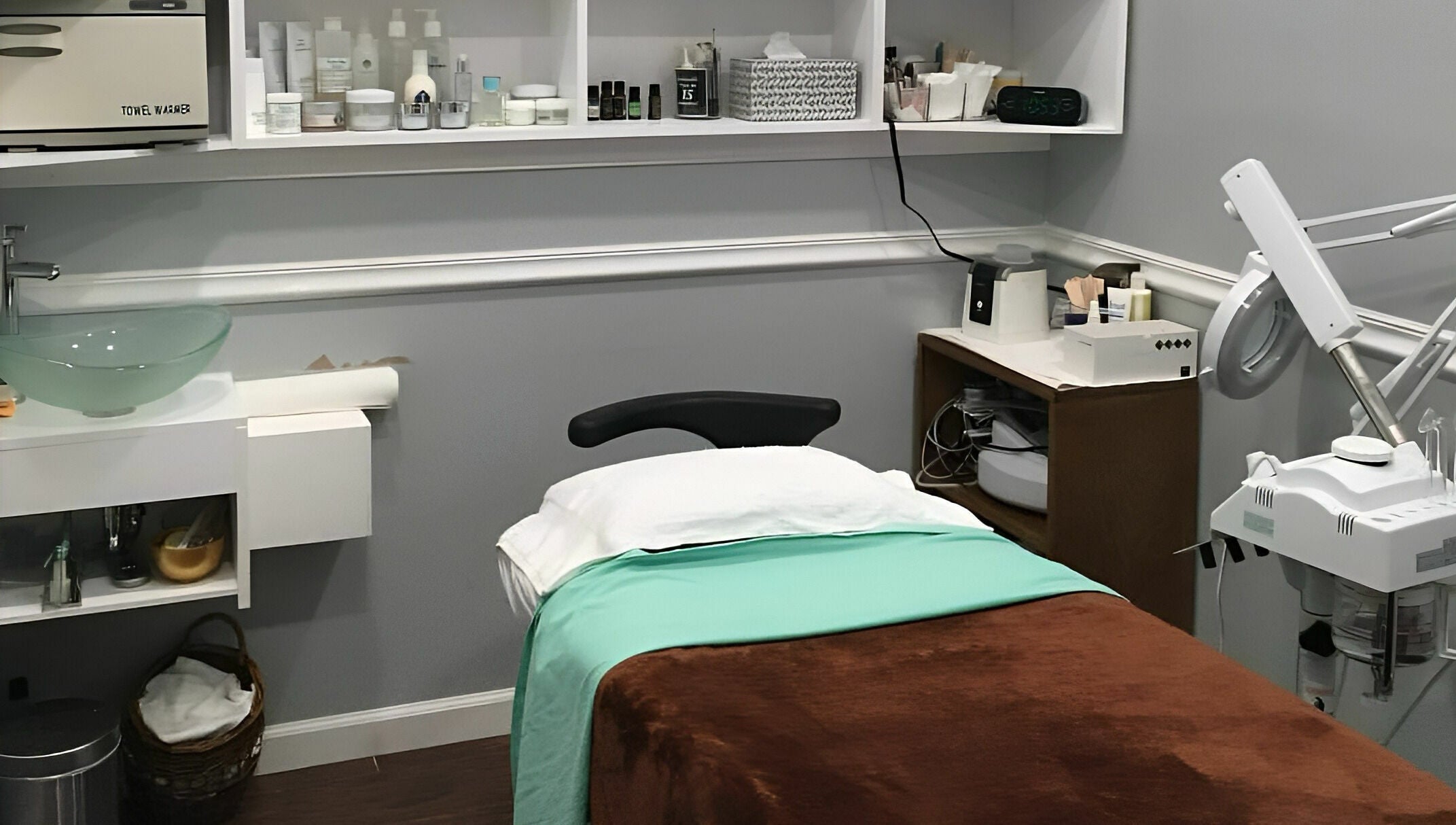 Cozy treatment room at Pure Green Locust Valley in Locust Valley, New York, US, featuring a massage table.