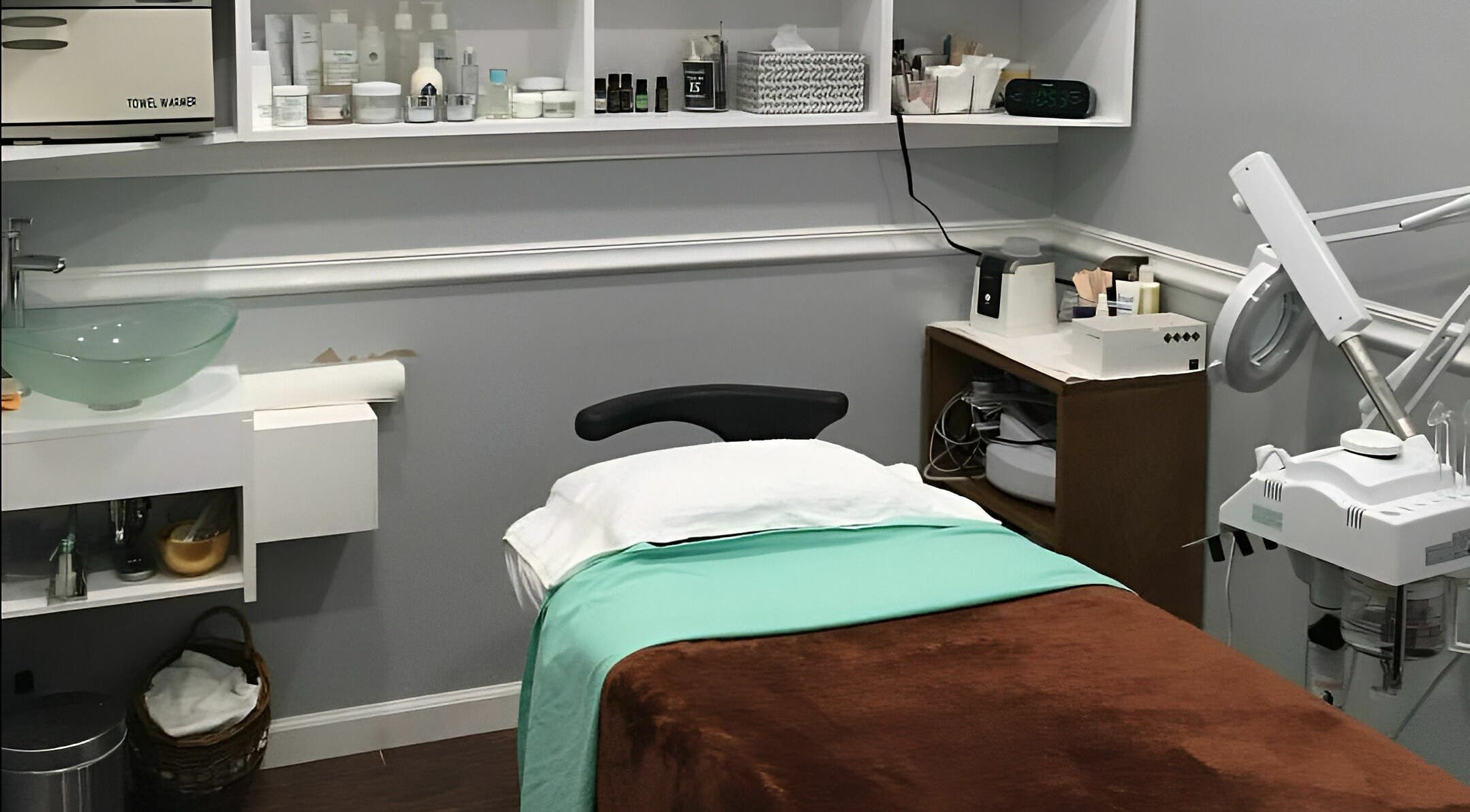Cozy treatment room at Pure Green Locust Valley in Locust Valley, New York, US, featuring a massage table.