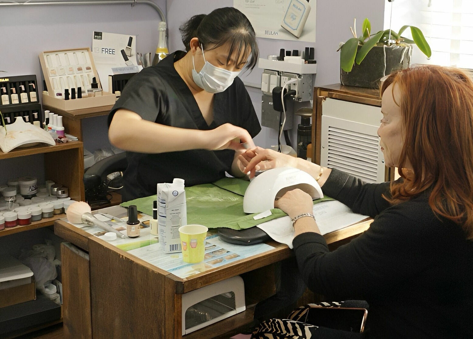 Manicure session at Pure Green Locust Valley, Locust Valley, New York, US, enhancing natural beauty.