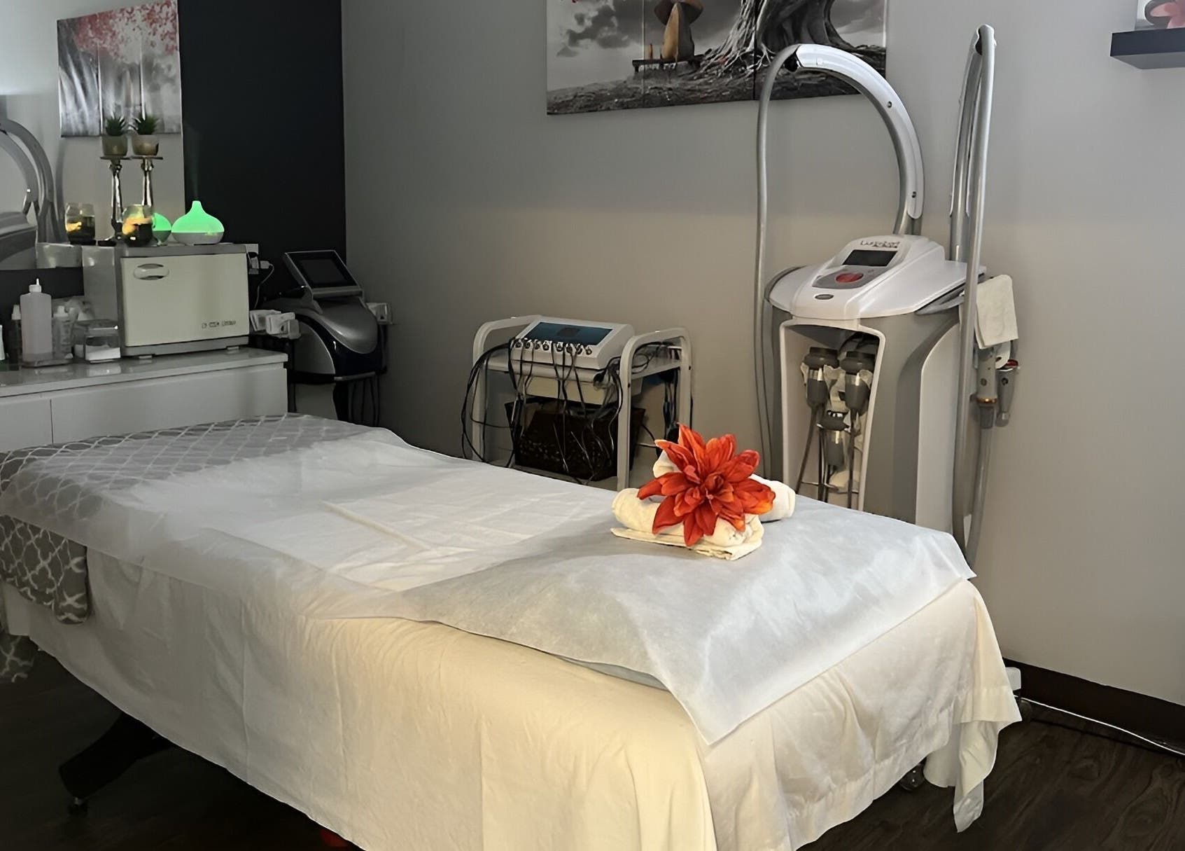 Tranquil spa room at Adriana's Health Spa, Hamilton, Ontario, CA, with massage table and calming decor.