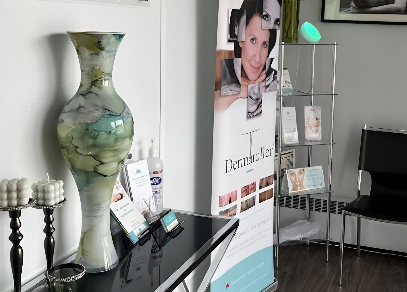 Elegant spa decor with candles and a large vase at Adriana's Health Spa in Hamilton, Ontario, CA.