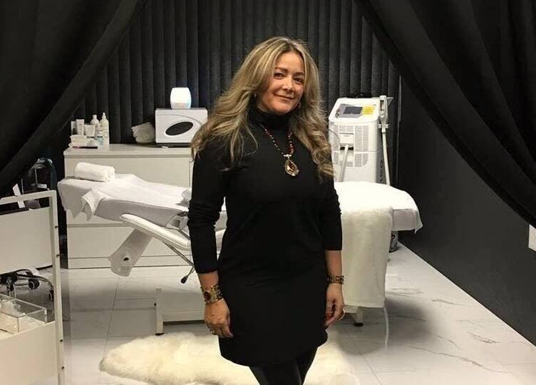 Sophisticated treatment room at Adriana's Health Spa in Hamilton, Ontario, CA, featuring modern decor and amenities.