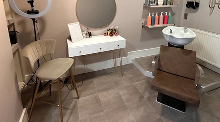 Modern salon styling chair and vanity at Beauty by Jo & Co, Adlington, England, GB.