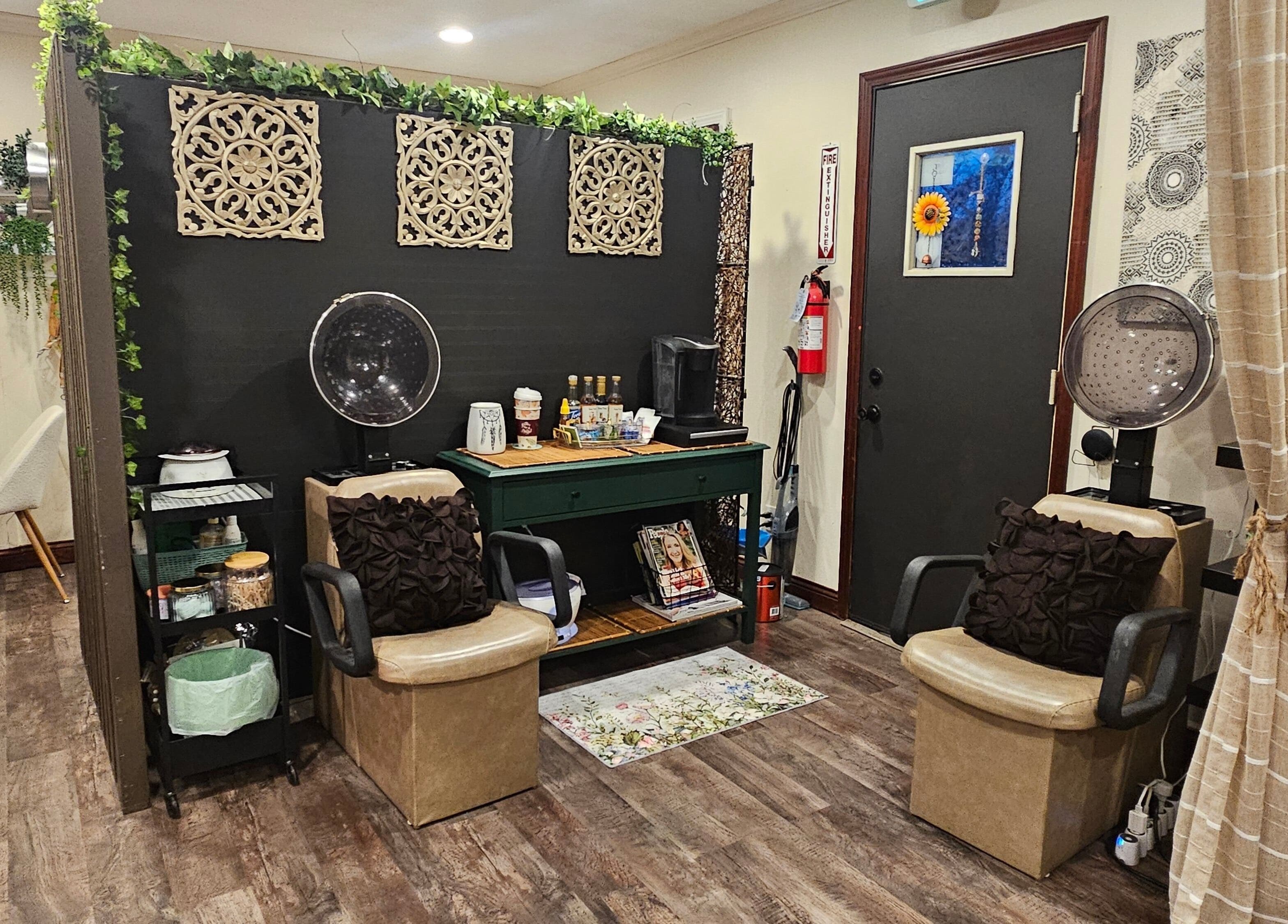 Modern salon interior at Simply Suite, Lima, Ohio, US with stylish decor and cozy chairs.