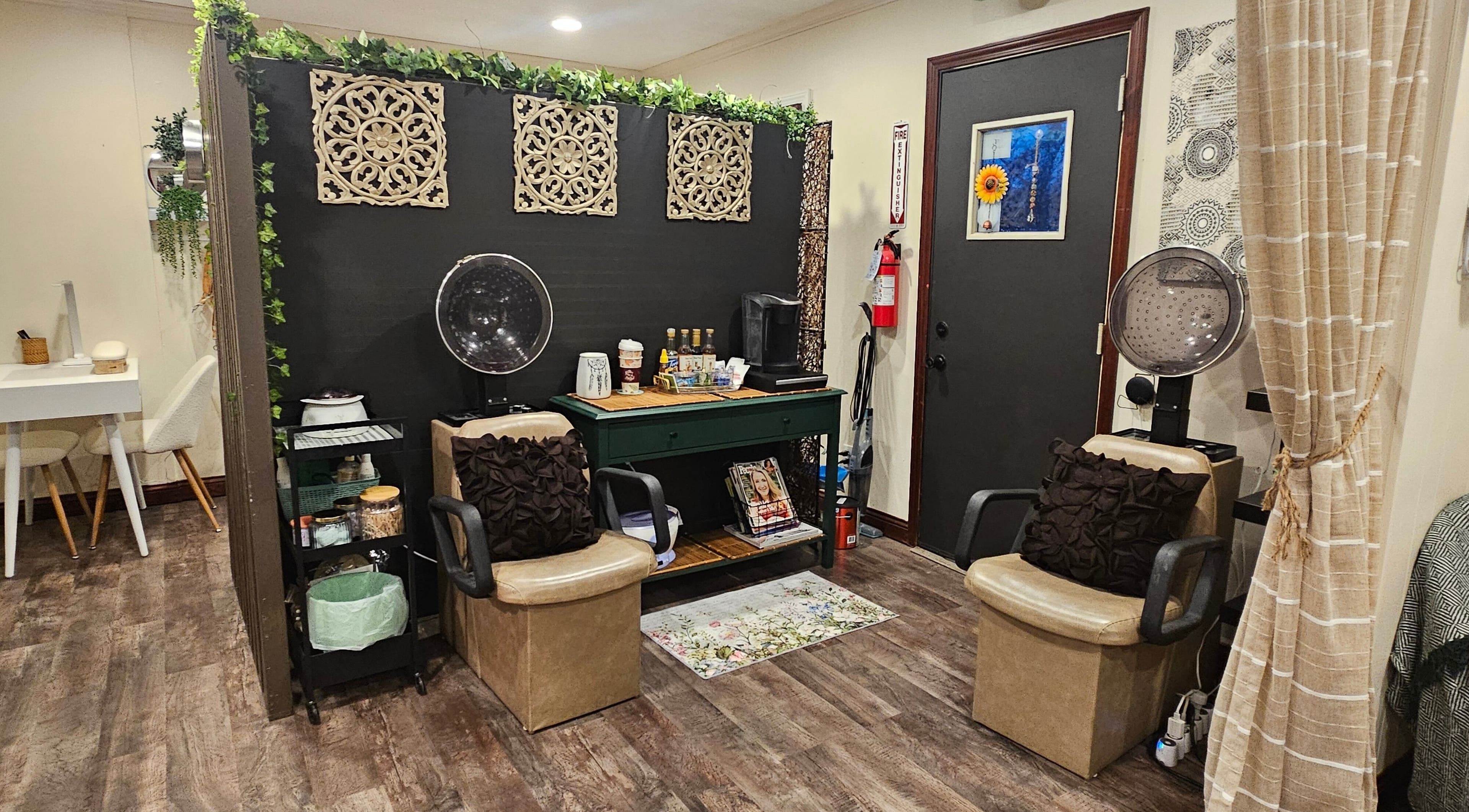 Modern salon interior at Simply Suite, Lima, Ohio, US with stylish decor and cozy chairs.