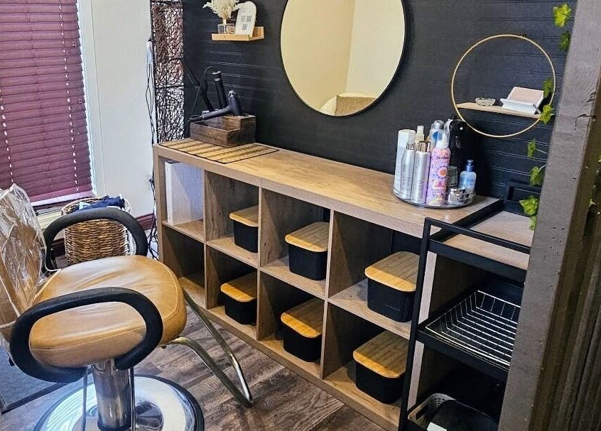 Simply Suite salon nook with stylish chair and storage in Lima, Ohio, US.
