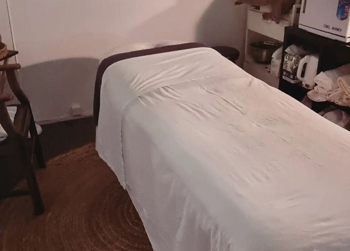 Massage room at Self Mind & Body in Dunedin, Otago, NZ featuring a cozy massage table and tranquil ambiance.