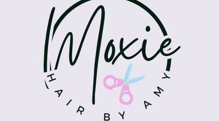 Logo for Moxie, Hair by Amy based in Panama City, Florida, US featuring stylistic text and scissors.