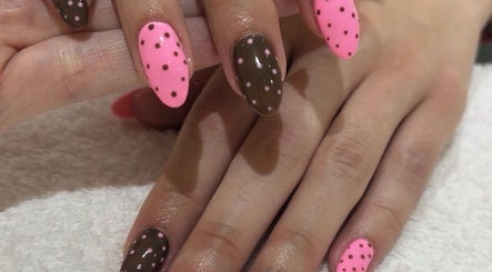 Stylish pink and brown polka dot nails at Beauty Boss, Dublin, County Dublin, IE.