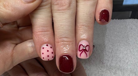 Manicure with red and pink nail art at Beauty Boss in Dublin, County Dublin, IE.