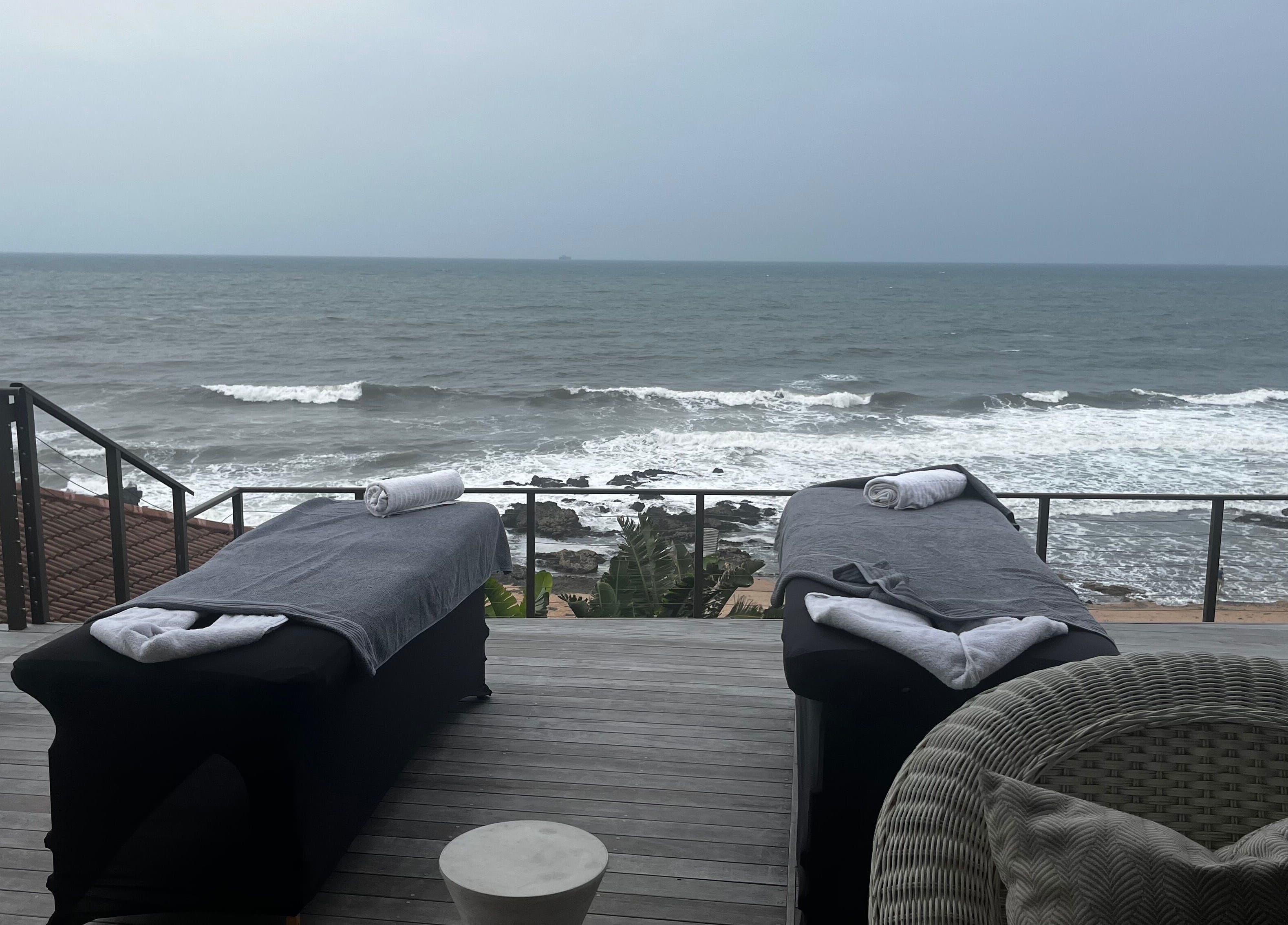 Relaxing massage tables at Zama’s Mobile Therapy overlooking ocean in Tongaat, Kwazulu-natal, ZA.