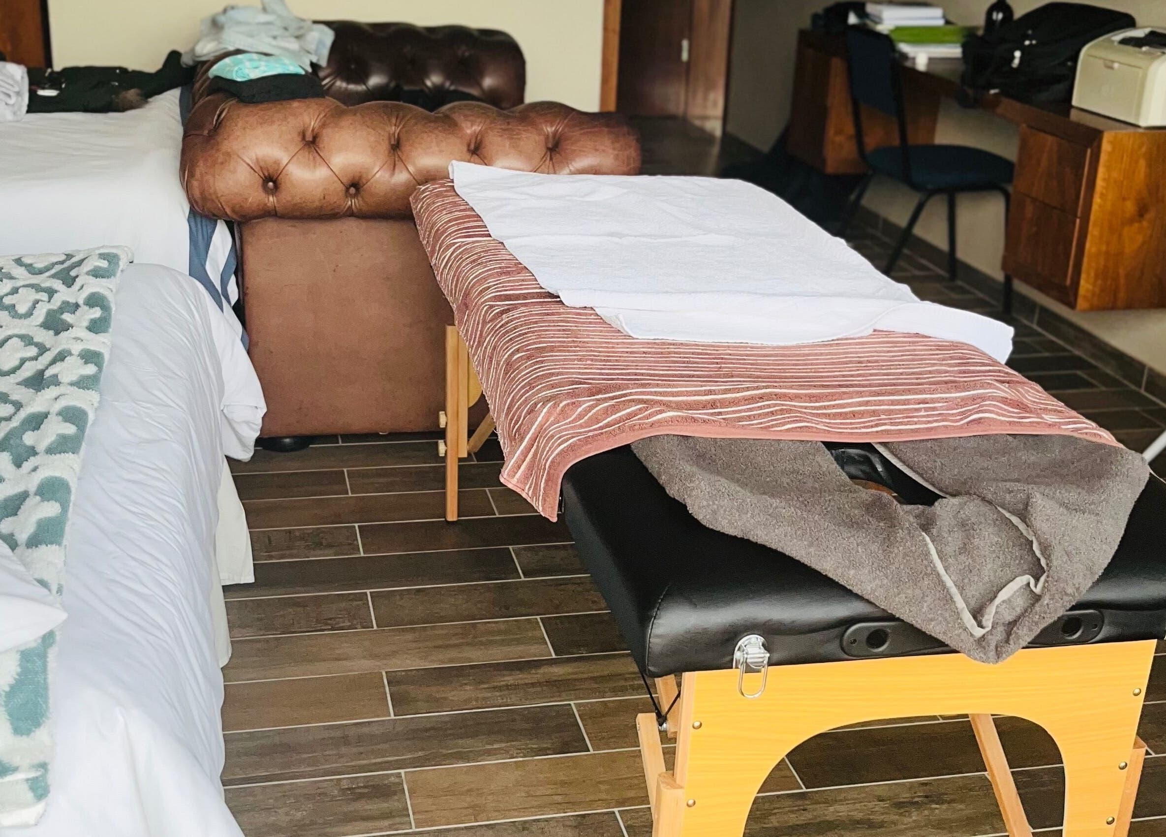 Massage table setup at Zama’s Mobile Therapy, Tongaat, Kwazulu-natal, ZA, offering a serene wellness experience.