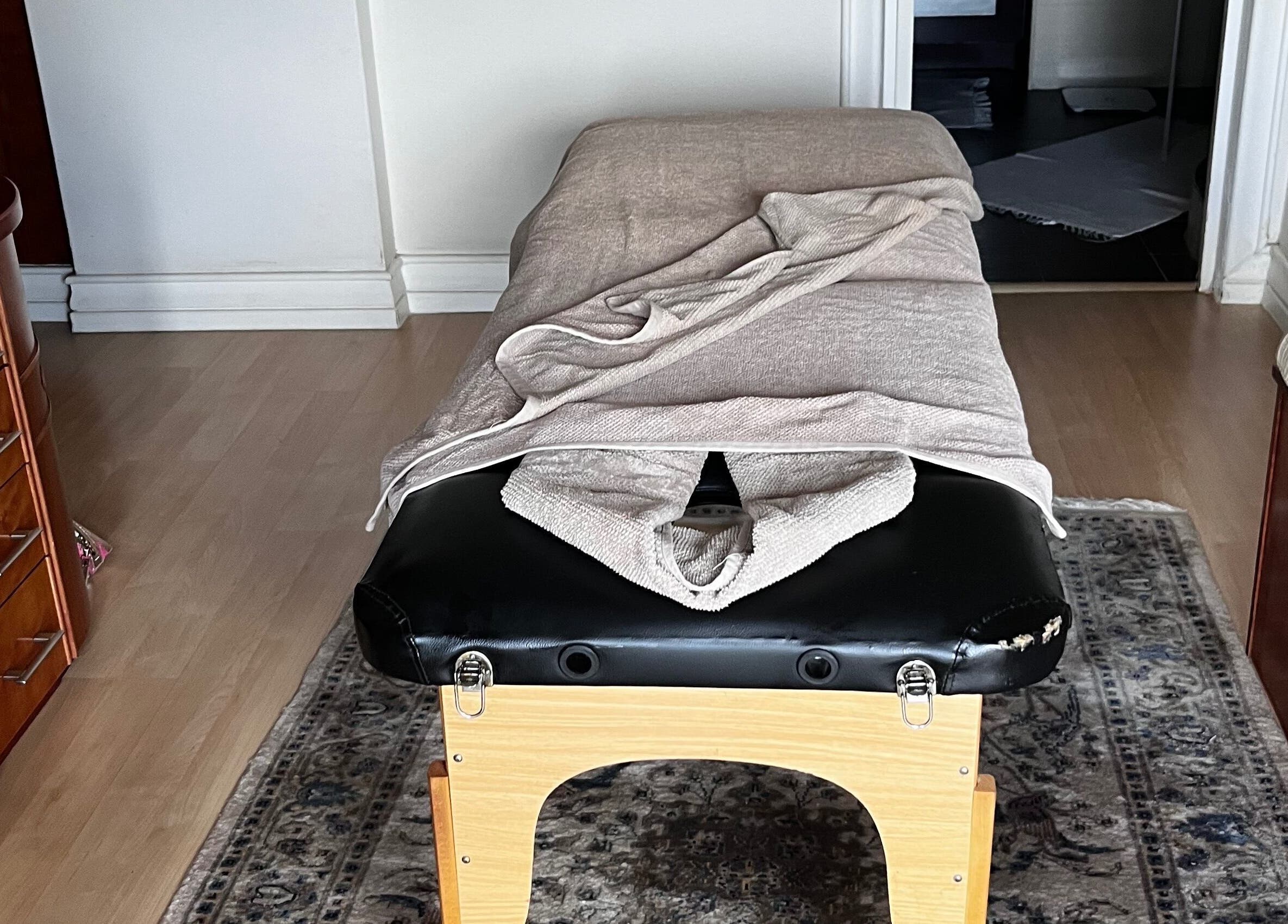 Relaxing massage table setup at Zama’s Mobile Therapy in Tongaat, Kwazulu-natal, ZA, offering calming ambiance.