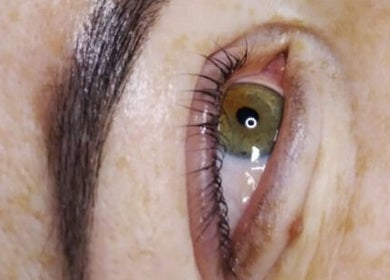 Close-up of expertly groomed eyebrow at Magnolia Beauty in Springs, Gauteng, ZA for a refined look.