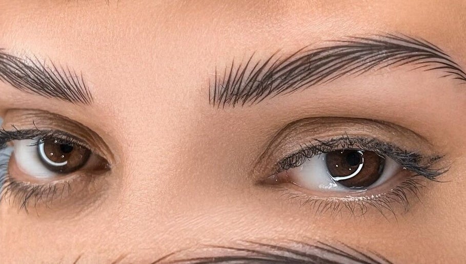 Close-up of expertly groomed brows at Enigma Prestige Beauty, Newbury, England, GB.