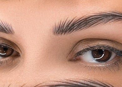 Close-up of expertly groomed brows at Enigma Prestige Beauty, Newbury, England, GB.