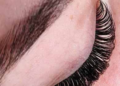 Close-up of a professionally styled eyebrow and lashes at Enigma Prestige Beauty, Newbury, England, GB.