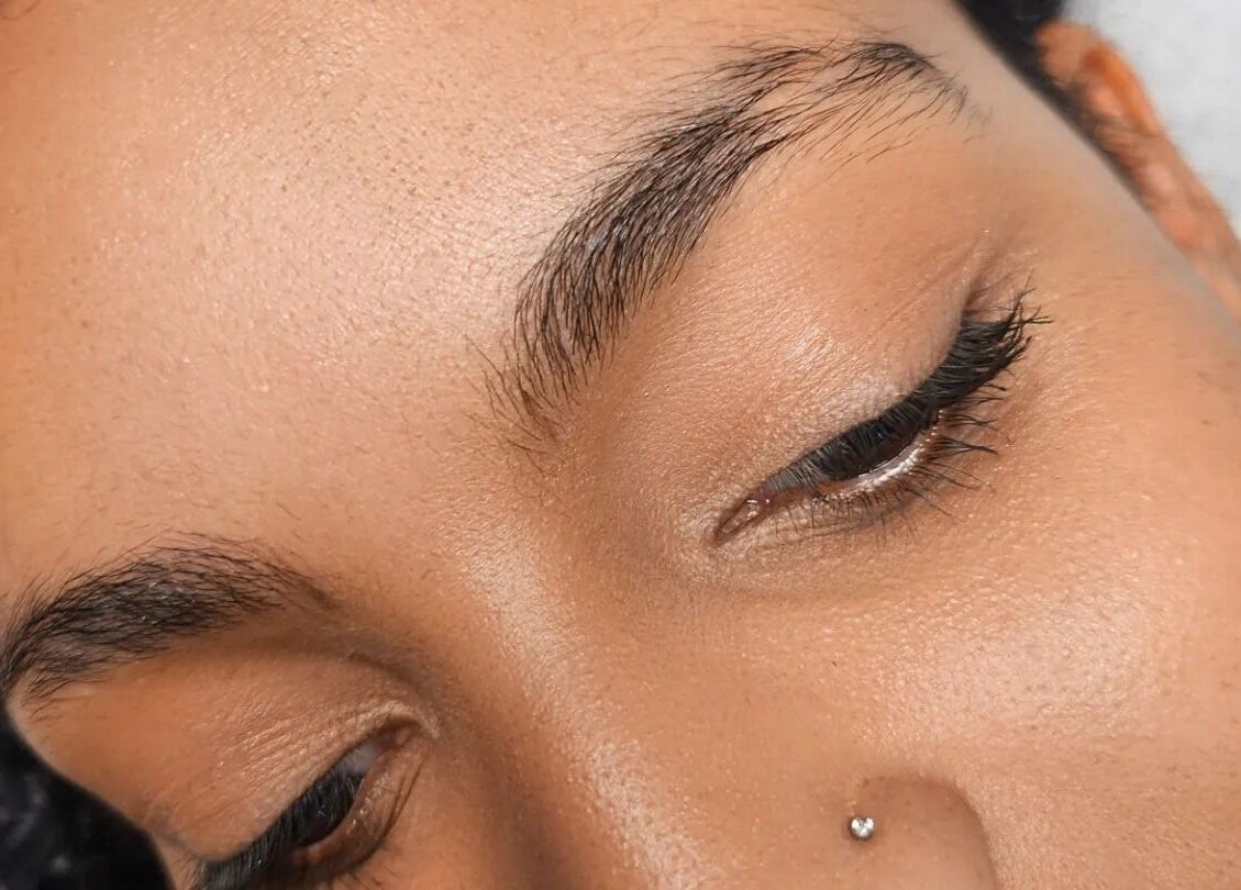 Close-up of perfectly groomed eyebrows at Enigma Prestige Beauty, Newbury, England, GB.