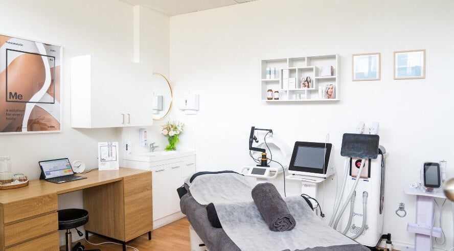 Calming treatment room at Myomy Wellness Pty Ltd, Melbourne, Victoria, AU with modern equipment and cozy setup.