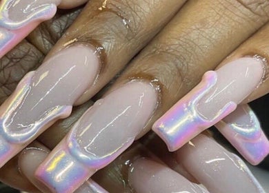Iridescent nail art design at Kreative Tips and Toes, Providenciales, TC, showcasing beauty trends.