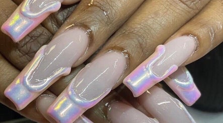 Iridescent nail art design at Kreative Tips and Toes, Providenciales, TC, showcasing beauty trends.