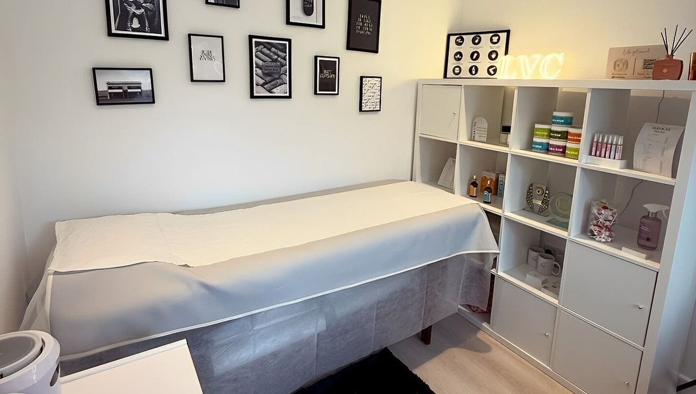 Cozy therapy room at LVC Beauty, Aberdeen, Scotland, GB, featuring treatment bed and wellness products.