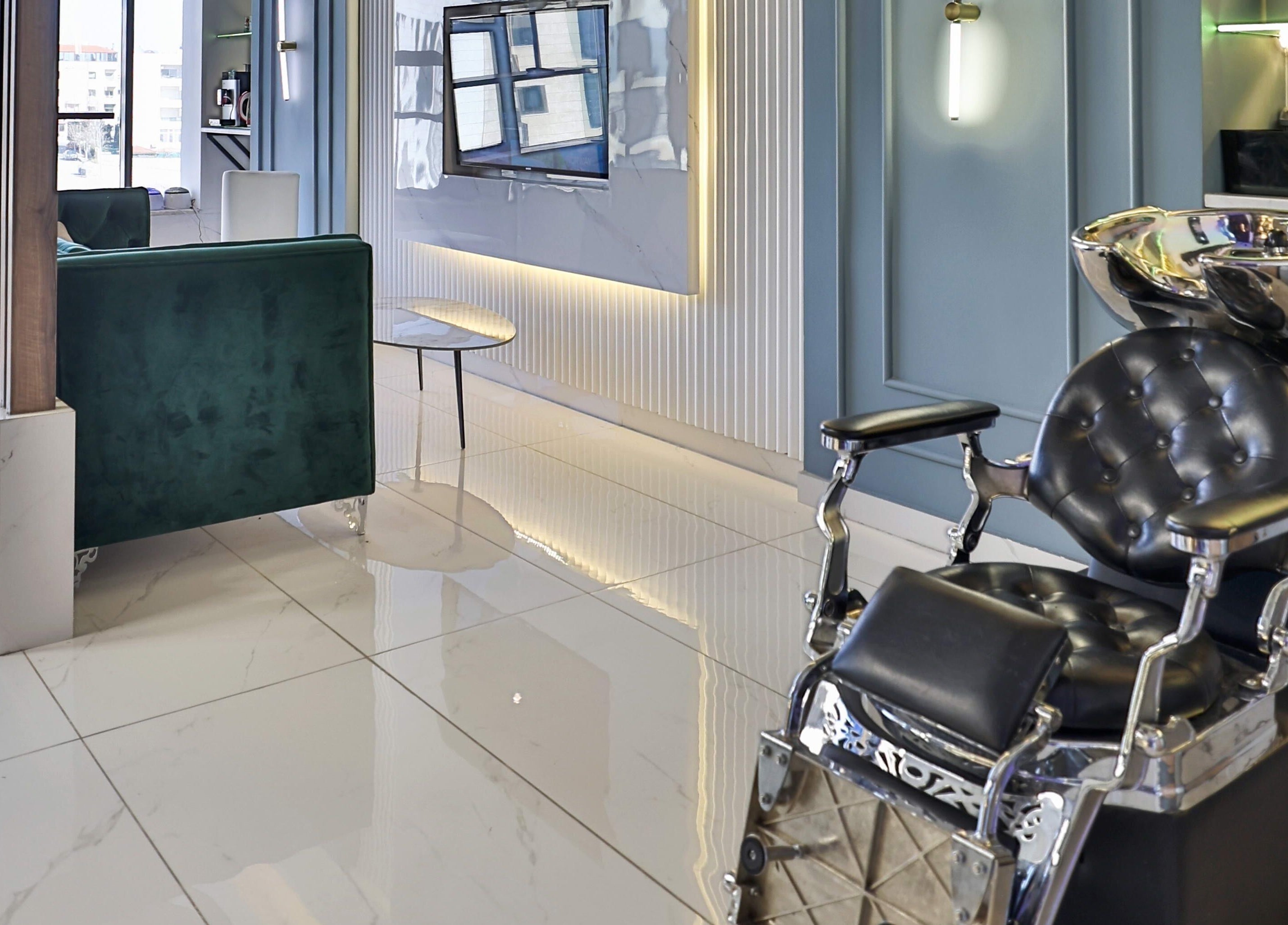 Luxurious interior at Signature Men's Spa By Mostafa, Amman with modern design and sleek furnishings.