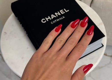 Elegant red manicure at ProBeauty in Virginia Beach, Virginia, US with sleek nail design.