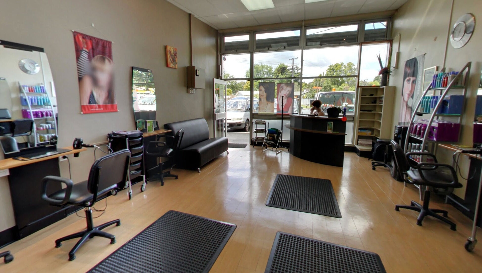 Interior of Styleworks salon in Auckland, Auckland, NZ, featuring elegant styling chairs and modern decor.