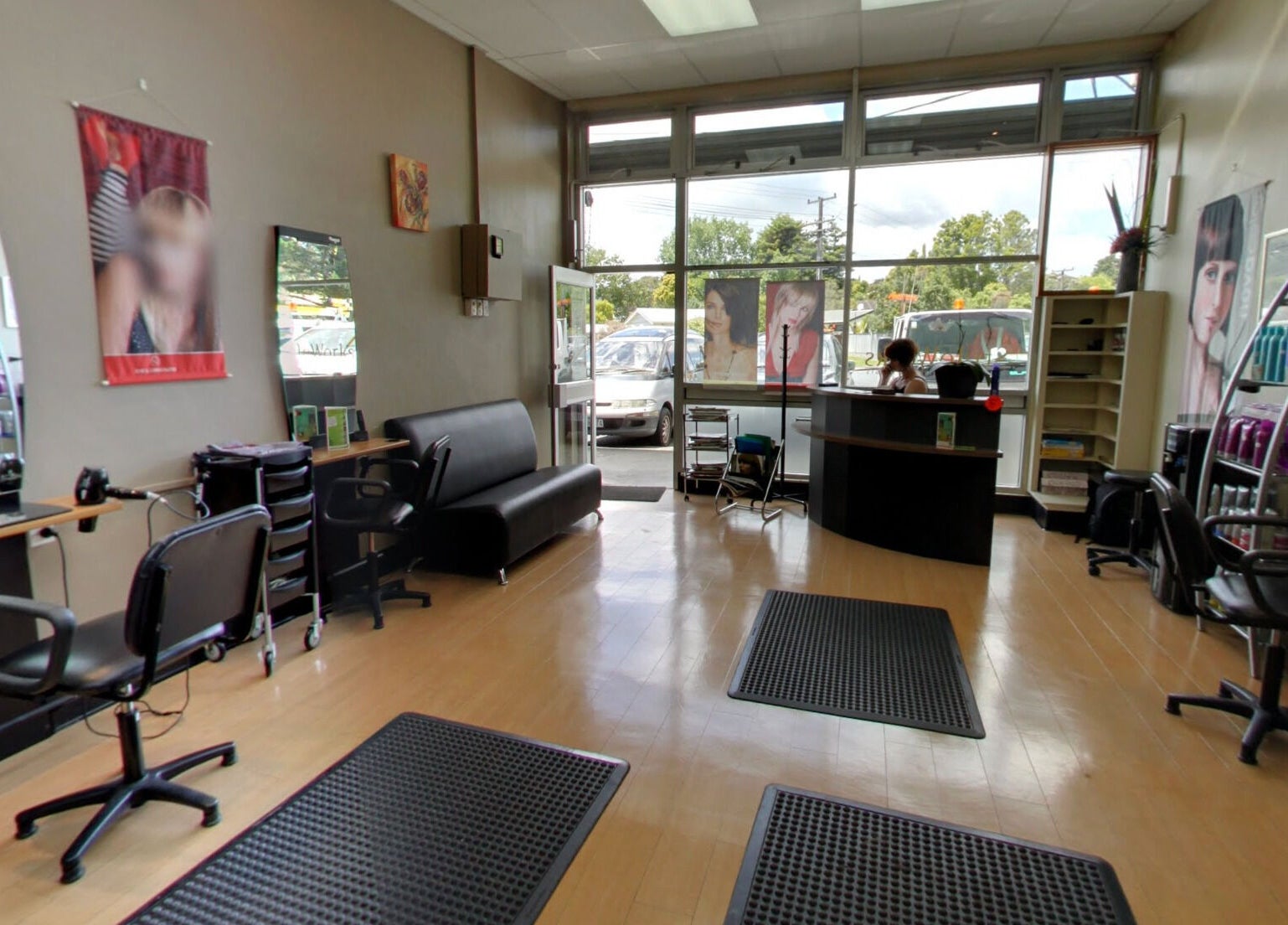 Interior of Styleworks salon in Auckland, Auckland, NZ, featuring elegant styling chairs and modern decor.