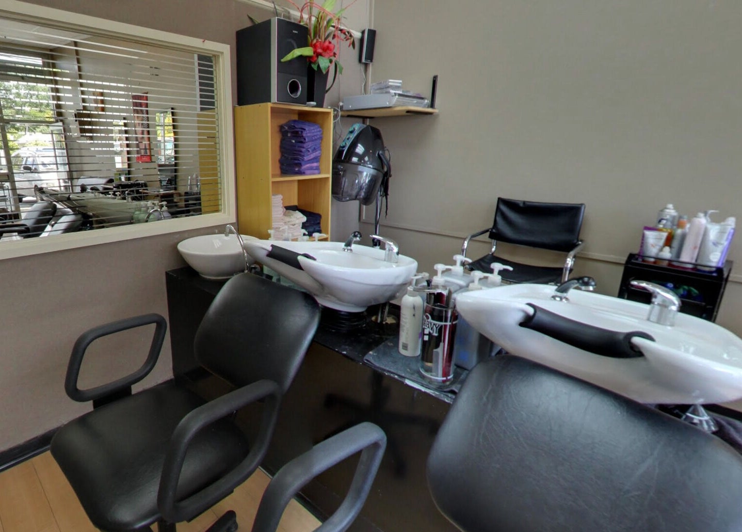 Modern washing stations at Styleworks salon in Auckland, Auckland, NZ, designed for ultimate comfort and style.