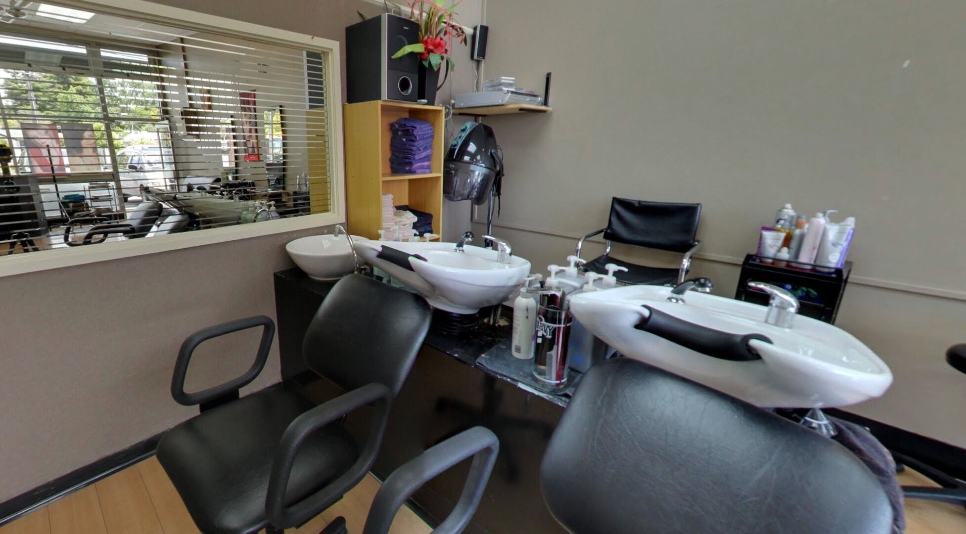 Modern washing stations at Styleworks salon in Auckland, Auckland, NZ, designed for ultimate comfort and style.