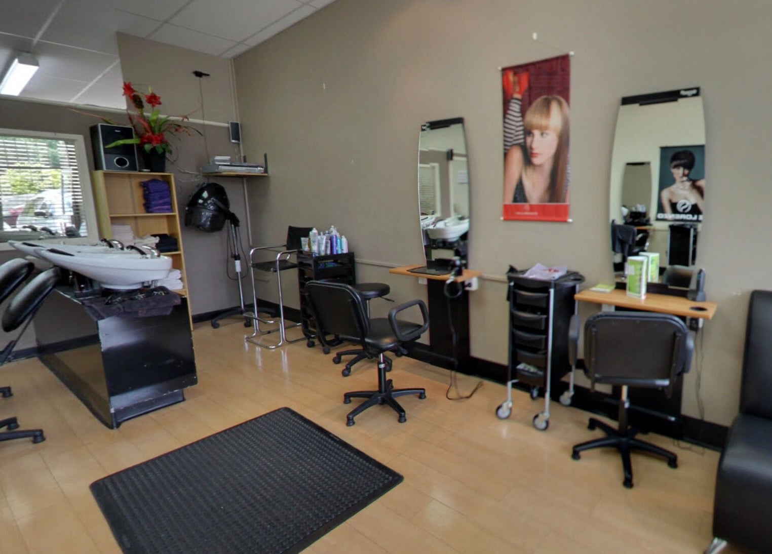 Modern interior of Styleworks salon in Auckland, Auckland, NZ with styling stations and sleek design.