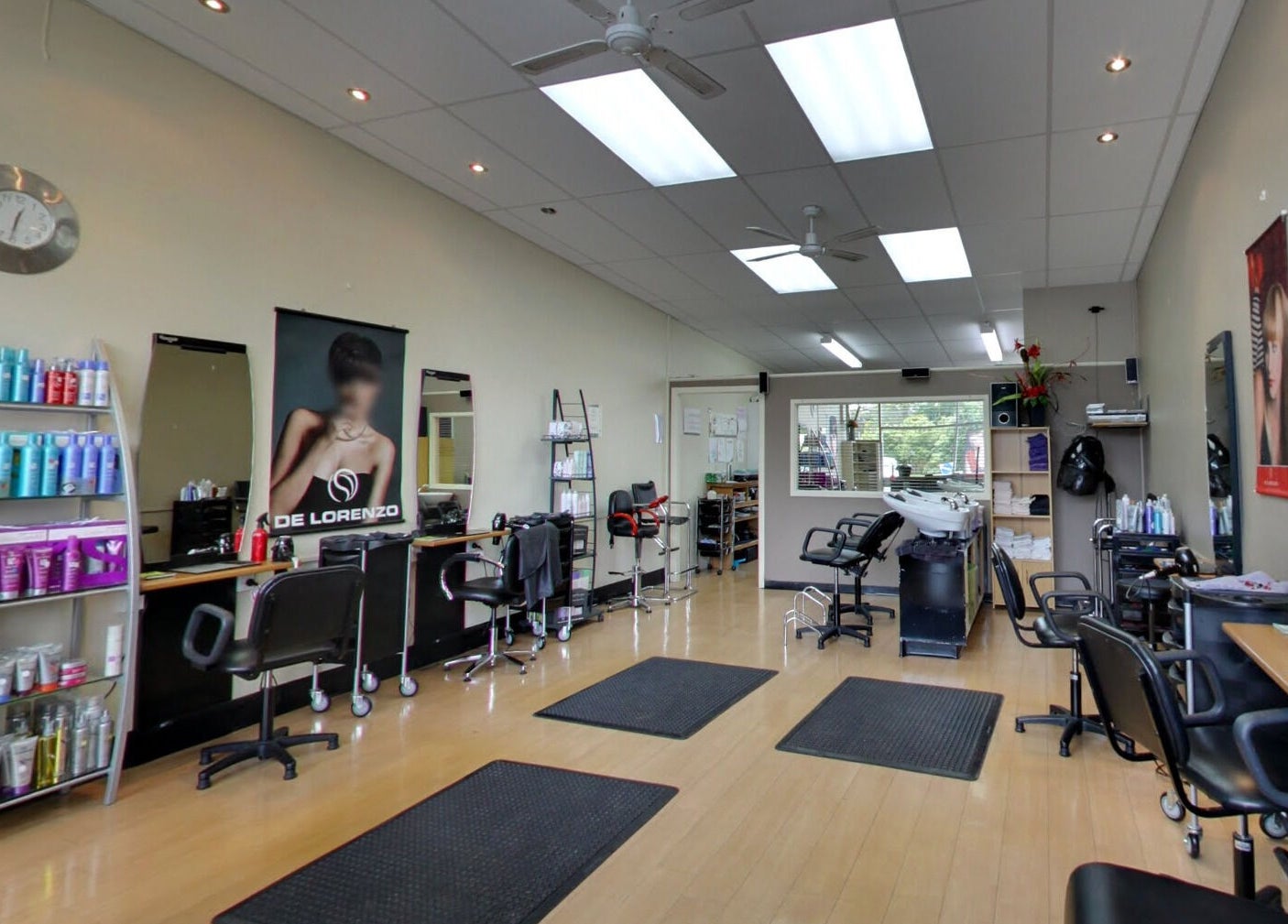 Modern interior of Styleworks salon, showcasing chairs and products in Auckland, Auckland, NZ.