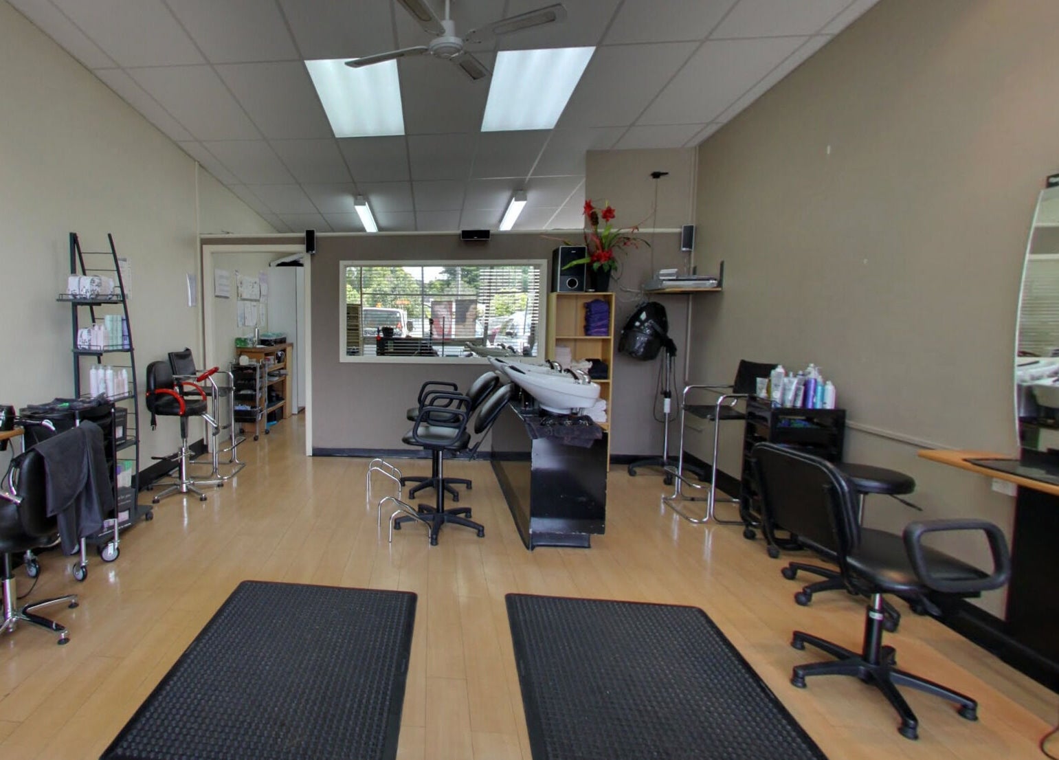 Modern salon interior at Styleworks salon, Auckland, Auckland, NZ with styling chairs and sleek design.