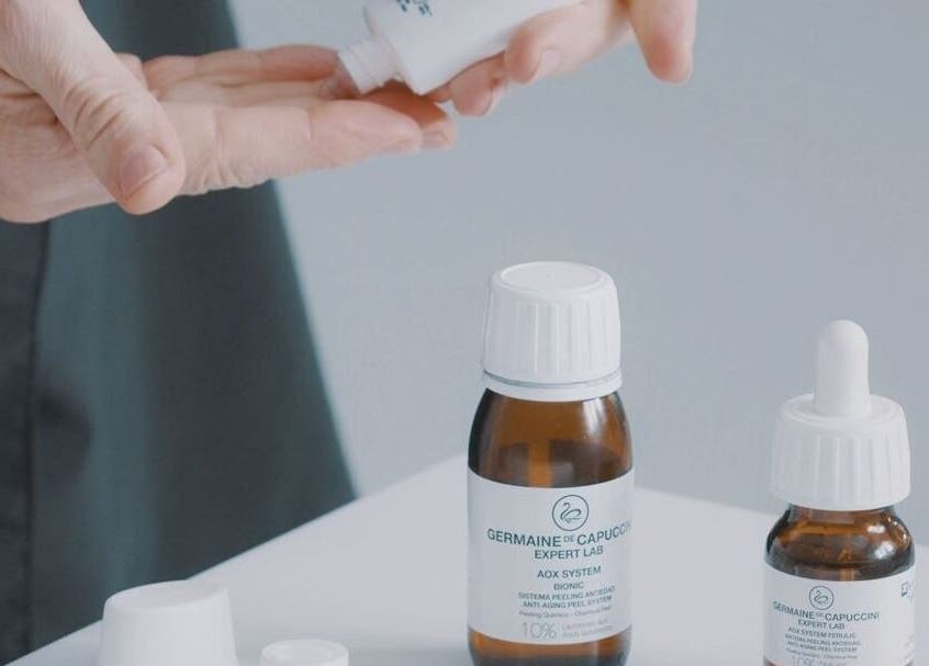 Hands using skincare products at Danugur Clapham-Stockwell, London, England, GB for wellness treatments.