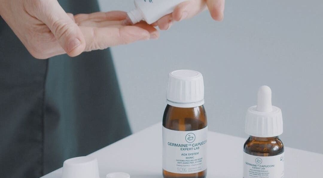 Hands using skincare products at Danugur Clapham-Stockwell, London, England, GB for wellness treatments.