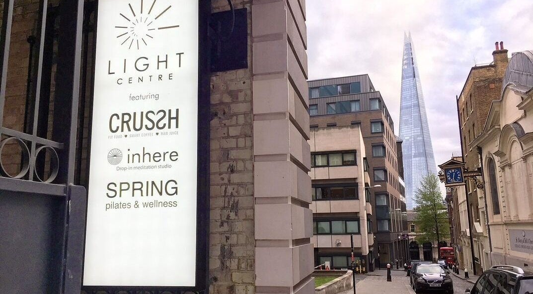 Danugur Monument view with The Shard in London, England, GB highlighting wellness venues.