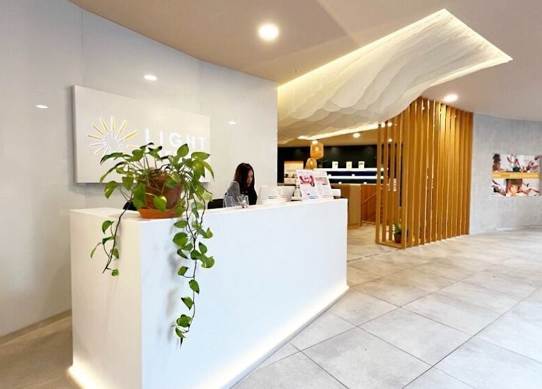 Elegant reception area at Mean (Men) Mareylebone, London, England, GB, featuring modern design and lush greenery.
