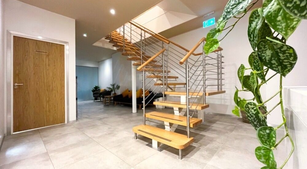 Stylish stairway and modern interior at Mean Men Mareylebone, London, England, GB.