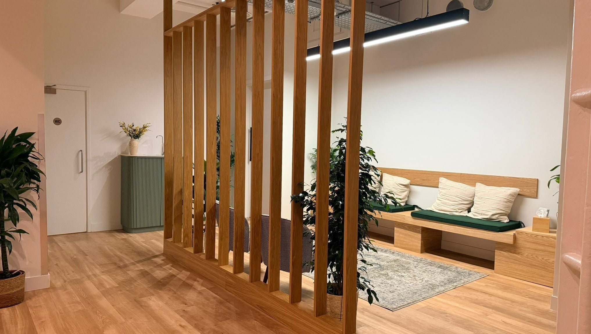 Elegant lounge area at Maen (Men) Old Street, London, England, GB, featuring cozy seating and warm decor.